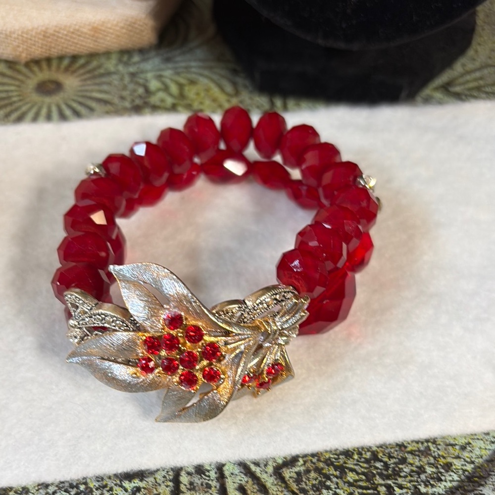 Elegant Red Beaded Bracelet with Floral Accent made by boutique fashion jeweler